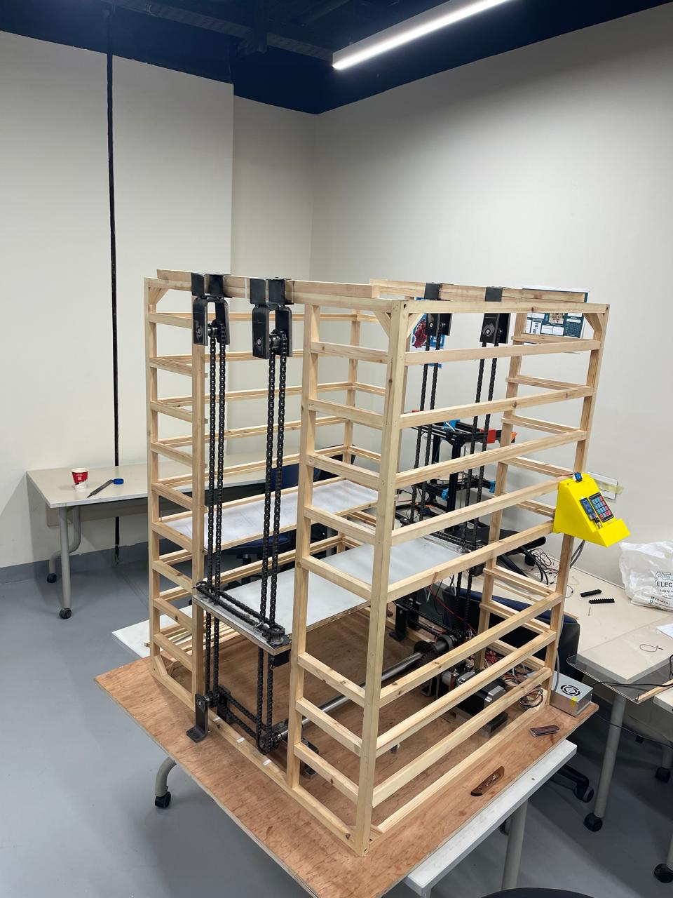Physical prototype structural frame with integrated vertical chain channels.